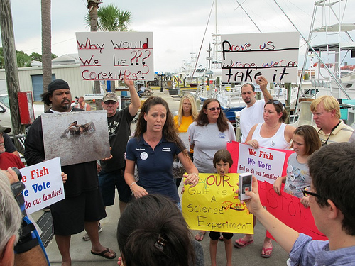 Kindra Arnesen voices concerns about the future of fishing on the Gulf Coast, at a rally of fishermen and families in August.
